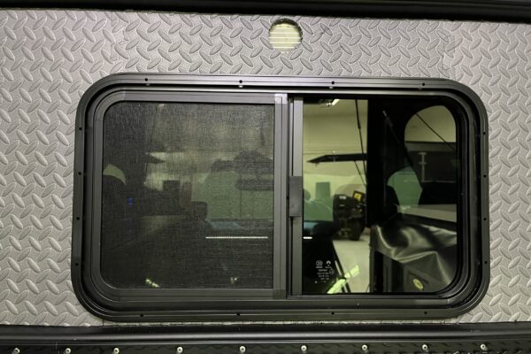 Interior L Track and Cab Passthrough window (not large enough to fit a person through)